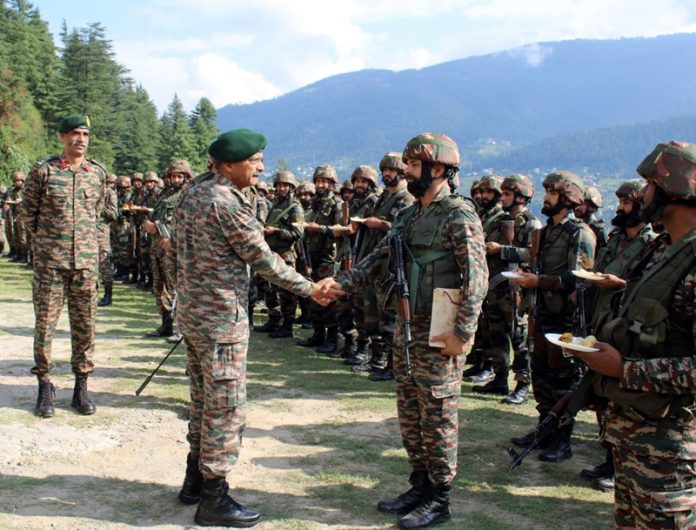 Northern Command chief Lt Gen MV Suchindra Kumar meeting the Army jawans in Doda area on Tuesday.