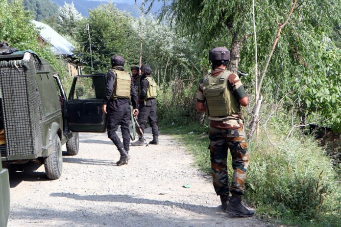 Troops in action during encounter in Kokernag area of Anantnag on Saturday. - Excelsior/Sajad