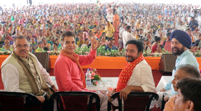 Union Minister G Kishan Reddy, party national general secretary Tarun Chugh and other BJP leaders at a rally in R S Pura on Monday. —Excelsior/Rakesh