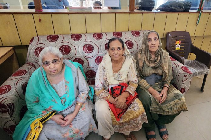 Elderly pensioners waiting for their turn for physical verification at a treasury in Jammu. -Excelsior/Rakesh