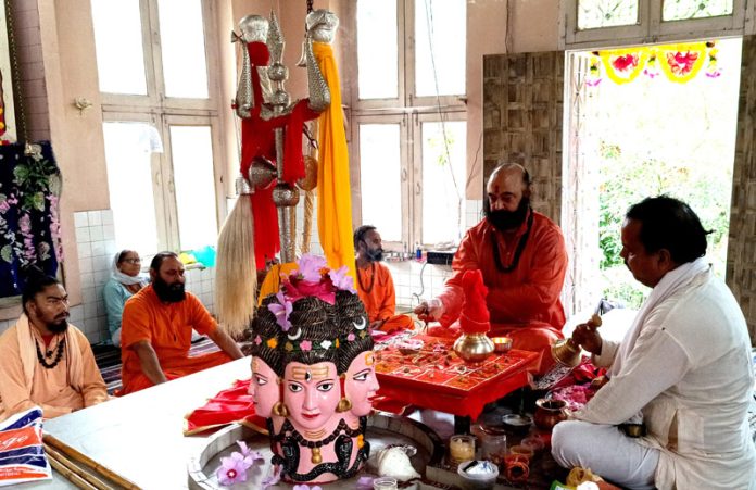 Chhari Sathapana being performed at Dashnami Akhara, Srinagar by Mahant Deependra Giri Ji and Sadhus on Wednesday. -Excelsior/Shakeel