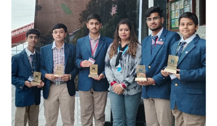 Students of Model Academy School (MIER) posing with mementos during Business Fest at Mussoorie.