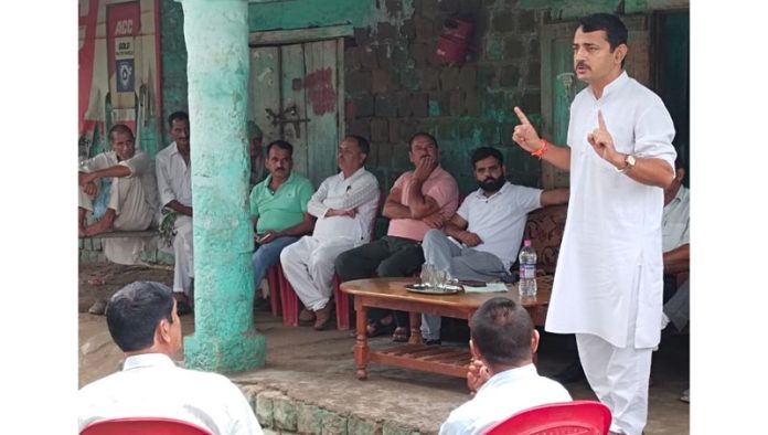 R S Pathania addressing a meeting of BJP cadres at village Ghar Dhamma in Udhampur.