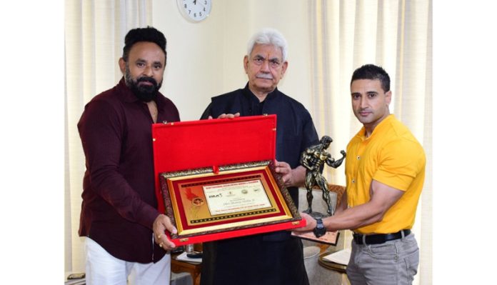 International bodybuilder Vimaljit, who recently won a Bronze Medal at the South Asian Bodybuilding Championship in the Maldives, met Lieutenant Governor Manoj Sinha at Raj Bhawan. Vimaljit was accompanied by Rajesh Dutta, General Secretary of the Body Builders Association J&K, and presented a memento to the LG on behalf of the Association. LG Manoj Sinha congratulated Vimaljit for his international achievement.