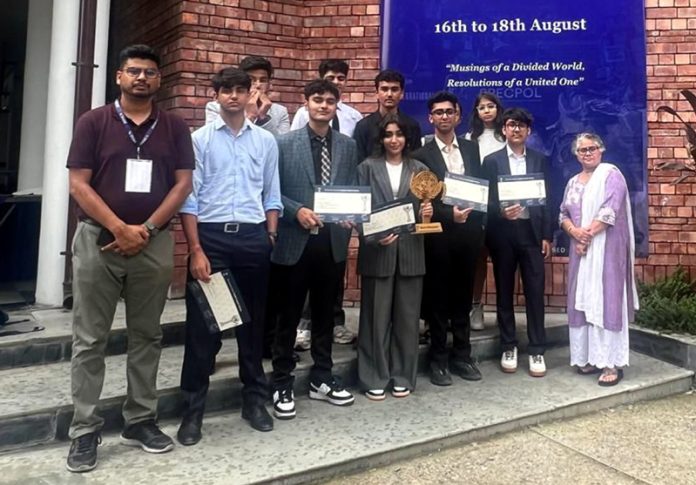 Jodhamal students posing along with certificates during Doon School MUN 2024.