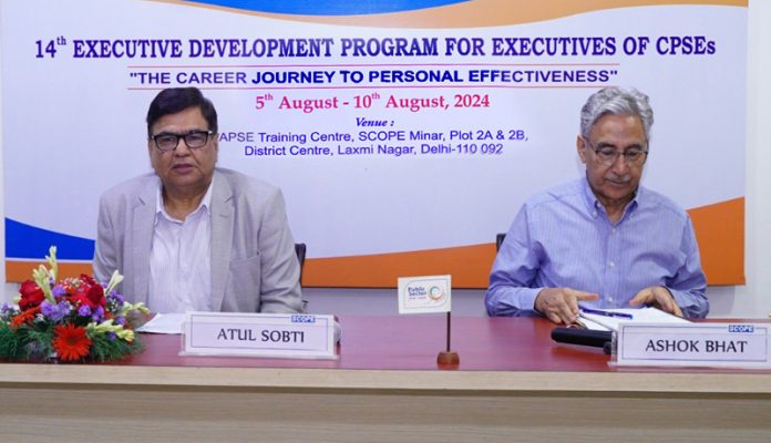 Dignitaries during a programme for Junior and Mid-Level Executives of CPSEs.