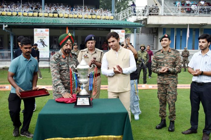 GOC 31 Sub Area, Divisional Commissioner Kashmir, VK Bidhuri unveiling league's trophy at Srinagar.