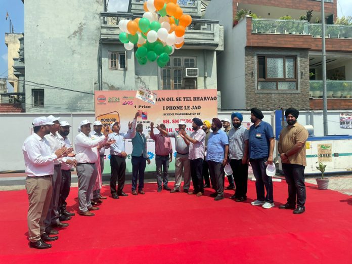 Dignitaries during the launch of lucky draw scheme at M/S Aar Pee Auto Aids petrol pump in Jammu on Tuesday.