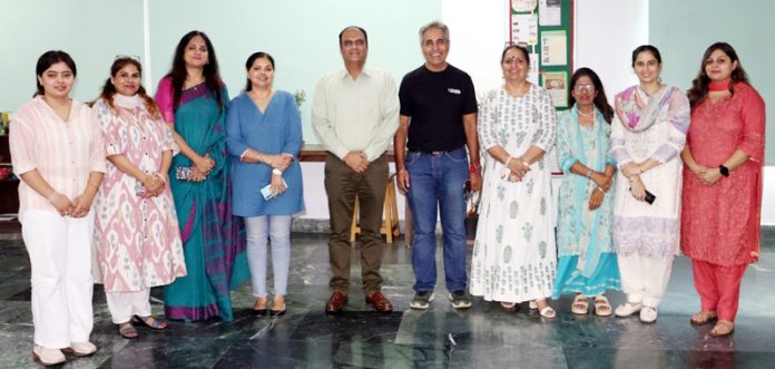 Team of Save Animal Value Environment (SAVE) and Heritage School faculty posing during workshop.