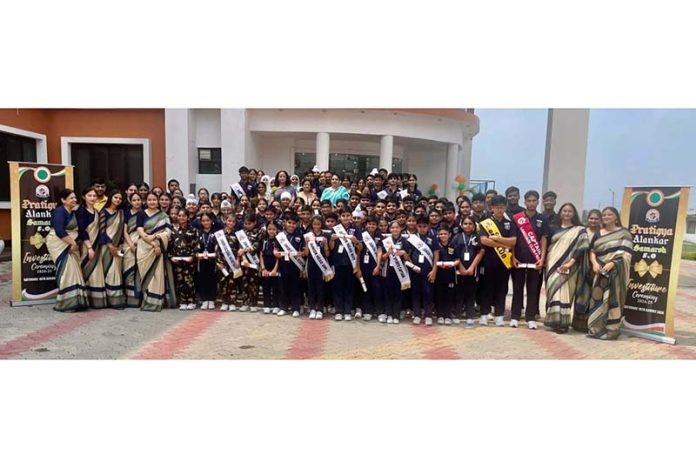 Newly elected Students Council of International Daily Rising School posing along with teaching staff.