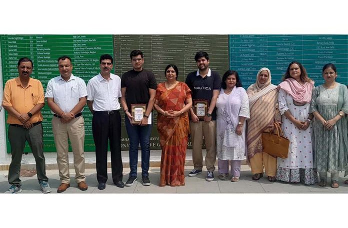 School Management of Delhi Public School, Jammu posing along with alumni on Saturday.