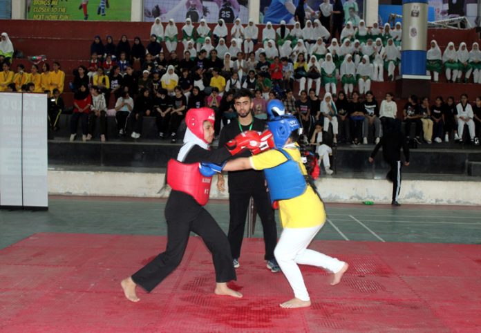 Athletes in action during District Wushu Championship.