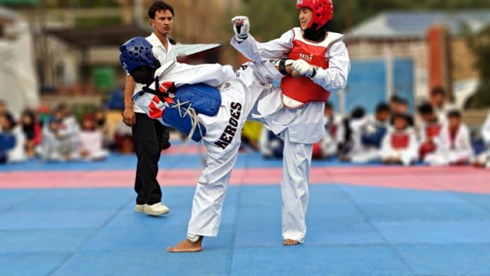 Players in action during final selection trials for Cadet National Taekwondo Championship at SAI Centre in Kargil.