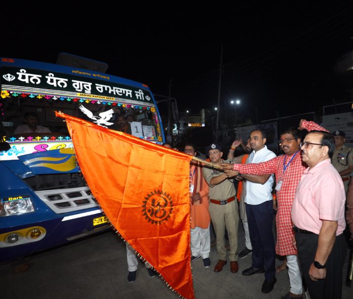 Div Com Jammu Ramesh Kumar and ADG Anand Jain flag off 1st batch of Shri Budha Amarnath Ji pilgrims in Jammu on Wednesday. -Excelsior/Rakesh