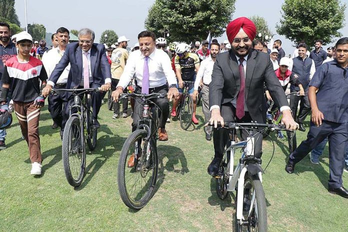 CEC along with ECs during cycle rally at Srinagar.