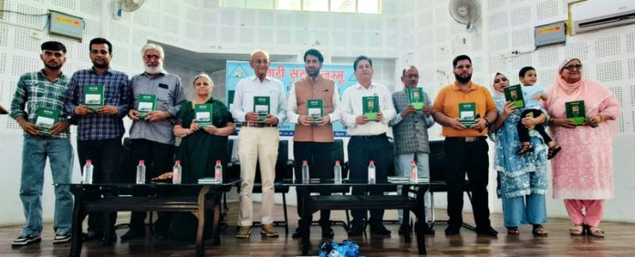 Dogri Sanstha office bearers and other litterateurs releasing Abdul Quddir Kundria’s collection of poetry.