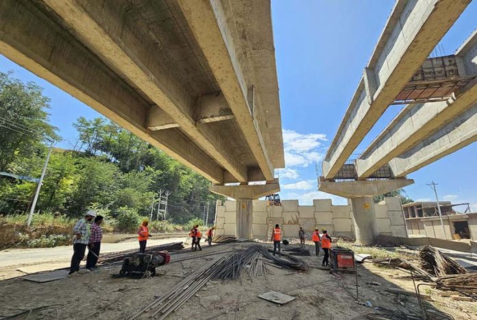Construction in full swing on Sangrama flyover along the Srinagar-Uri National Highway in North Kashmir. -Excelsior/Aabid Nabi