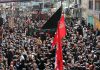 A large number of mourners participating in procession taken out by JUIAK in Kargil on Monday.