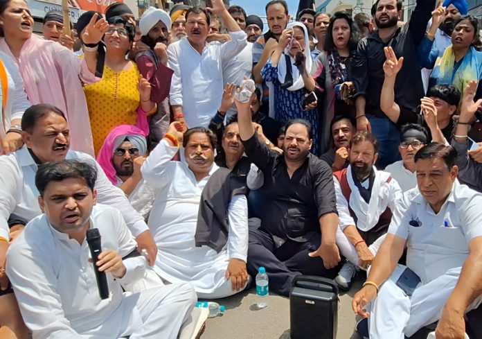 Congress leaders staging a demonstration in Jammu on Monday.