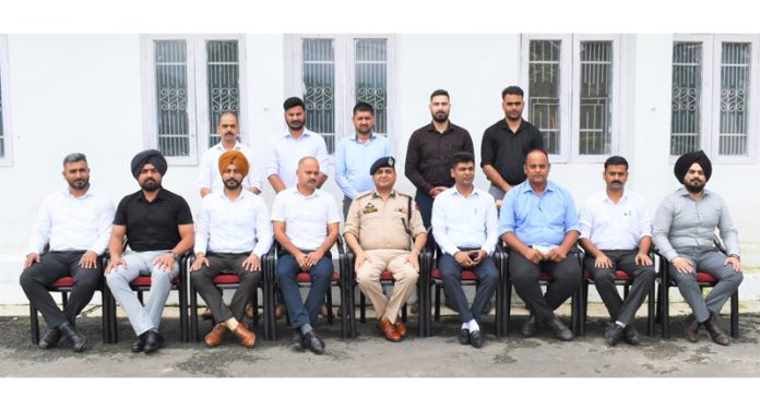 Deputy Director (Indoor Training), SKPA Udhampur, RK Gupta posing with PSIs of J&K Police during a seminar at Udhampur.