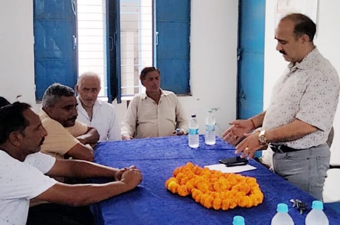 BJP leader, Ved Sharma addressing a meeting at R.S Pura on Wednesday.