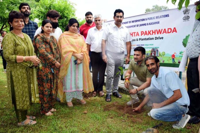 Joint Director Information Atul Gupta planting a sapling at Jammu on Wednesday.