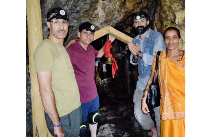 Devotees paying obeisance at Chota Amarnath Cave.