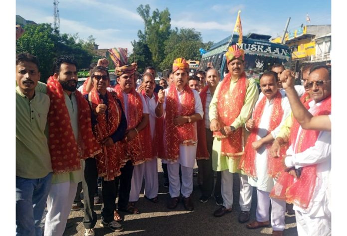 BJP leader, Ranbir Singh Pathania flags off a Yatra to Sudh Mahadev in Udhampur on Monday.