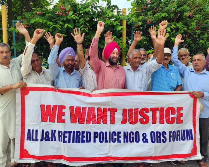 Members of Non-Gazetted Police Pensioners Welfare Forum staging protest in Jammu on Monday.