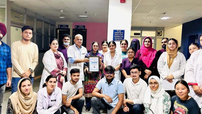 Doctors, students and others pose for a group photograph during the culmination of Oral Hygiene Week at IGGDC, Jammu.