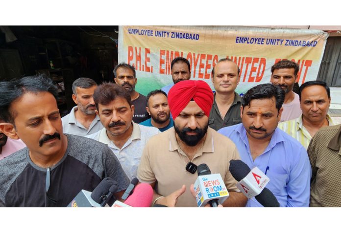 PHE daily wage workers' leaders talking to media-persons at B C Road PHE Complex in Jammu on Saturday. —Excelsior/Rakesh