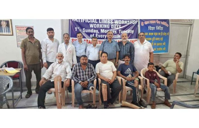 AVJC office bearers with the beneficiaries at the camp in Jammu on Sunday.