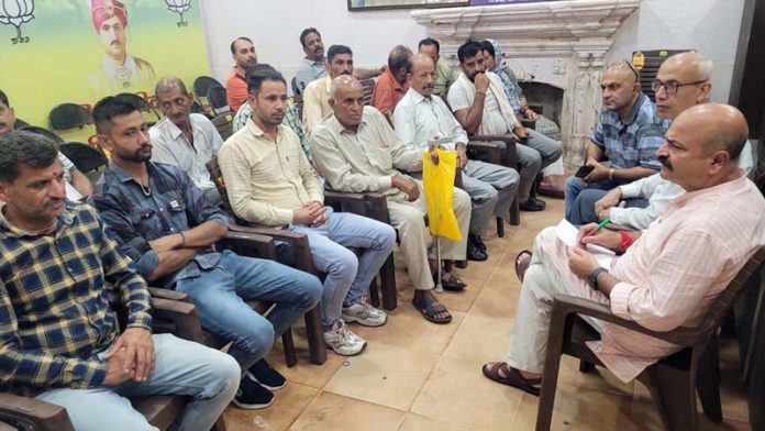 BJP vice president, Yudhvir Sethi listening public grievances at Jammu on Thursday.