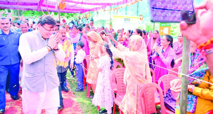 CM Pushkar Singh Dhami addressing a public meeting in Bani on Wednesday.