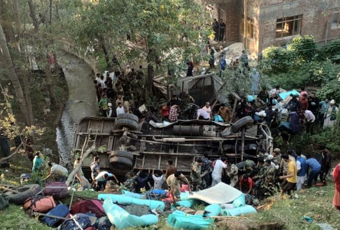 Ill-fated bus which met with an accident at Waterhail, Budgam on Friday.