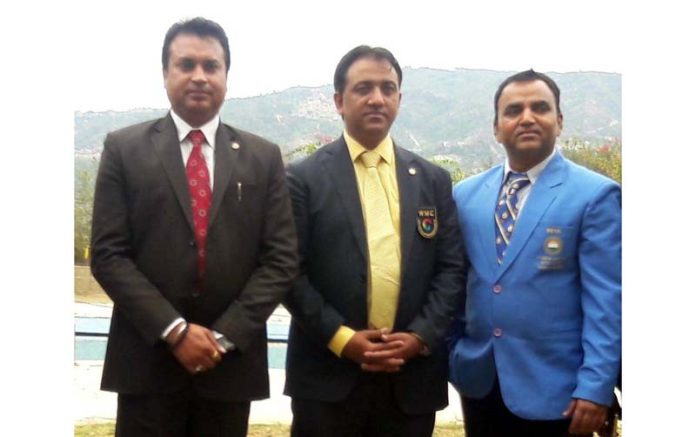 Tarsem Sharma with Shammi Rana, secretary general of ICTSG and Aman Sharma pose for a photograph.