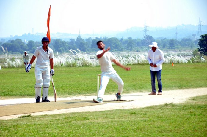 A bowler in action on Day 3 of Inter-District Division Level Cricket Competition, U-19 Boys at Nagrota.