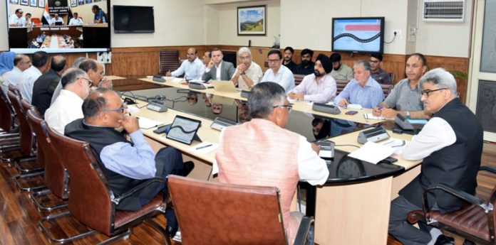 Chief Secretary Atal Dulloo chairing a meeting.