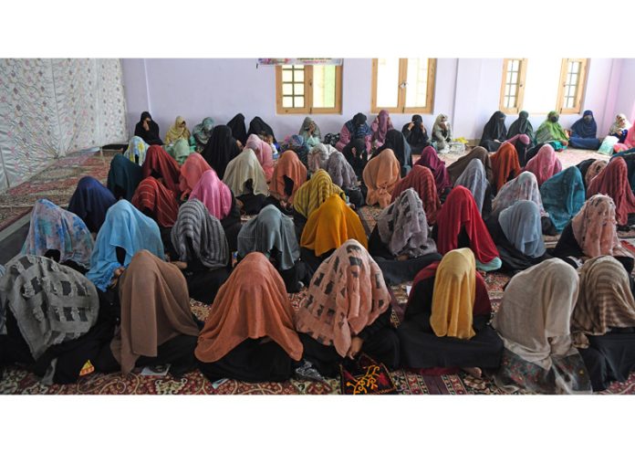 Brides during a mass marriage ceremony at Haj House Bemina in Srinagar. -Excelsior/Shakeel