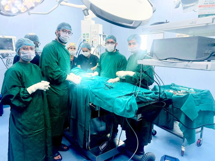 A team of doctors performing a surgery of an infant in AIIMS at Jammu on Thursday.