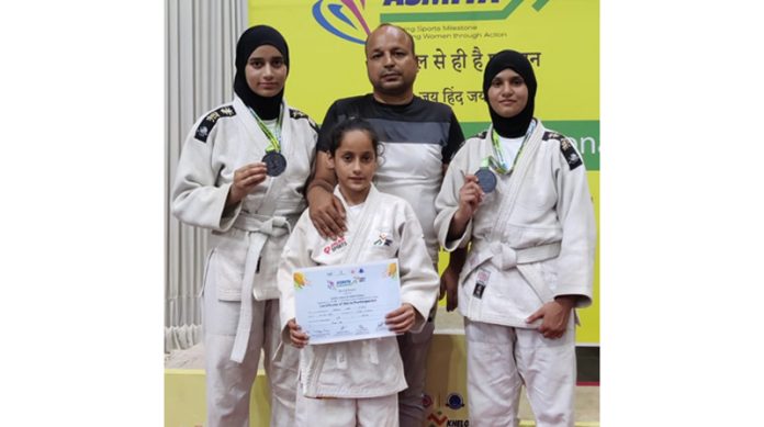 J&K Judokas posing with Manish Chatwal, Judo Instructor.