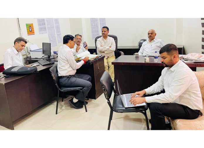 Rakesh Mahajan, Incharge of all cells of BJP during his visit to party's Election War Room in Jammu on Wednesday.