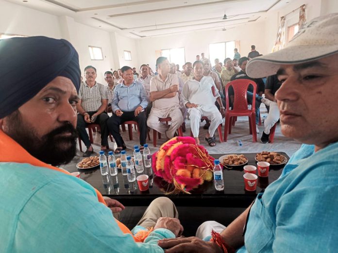 BJP national secretary Dr Narinder Singh addressing gathering at RS Pura.