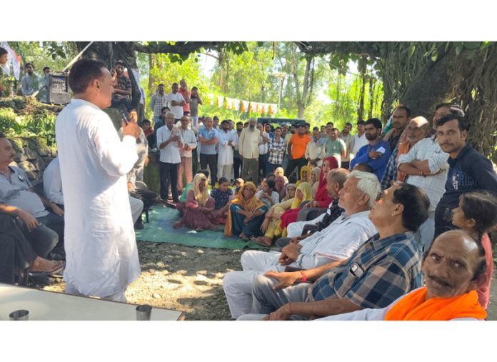 Independent candidate Jugal Kishore addressing a rally at Katra segment on Sunday.