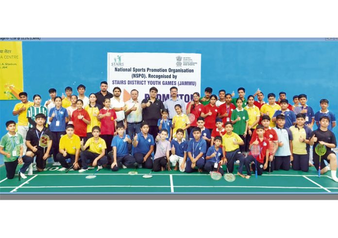 Badminton players posing along with dignitaries during an event at Jammu.