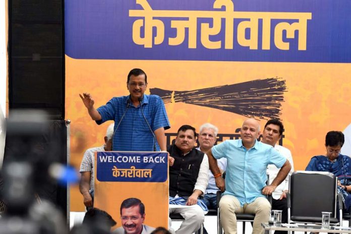 Delhi Chief Minister Arvind Kejriwal addresses a party workers’ meeting in New Delhi on Sunday. (UNI)