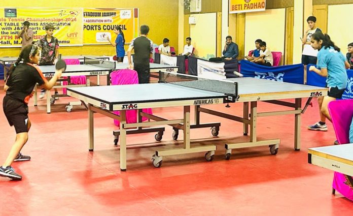 Young girls in action during 3rd J&K Ranking Table Tennis Championships at Jammu.