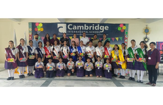 Newly elected students council of Cambridge school posing for group photograph.