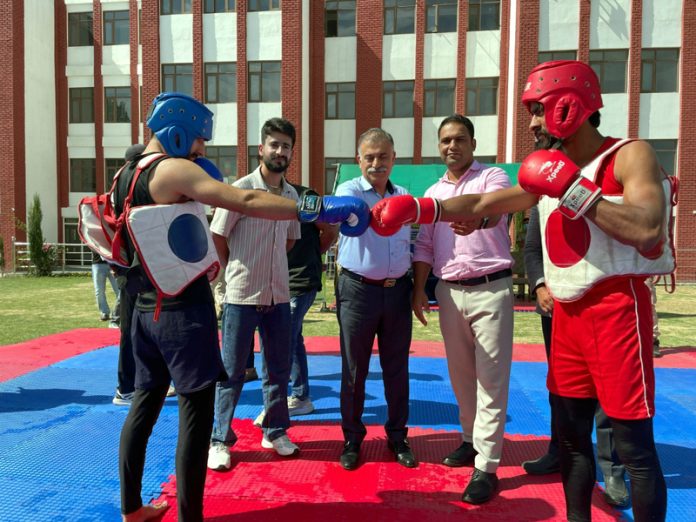 Chief guest introducing Wushu athletes during District Championship at Bandipora.