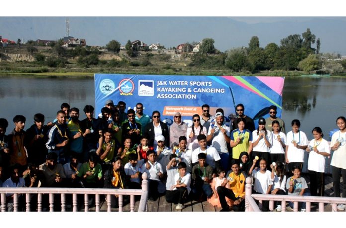 Athletes posing along with dignitaries during 10th UT Canoe Sprint Championship at Srinagar.